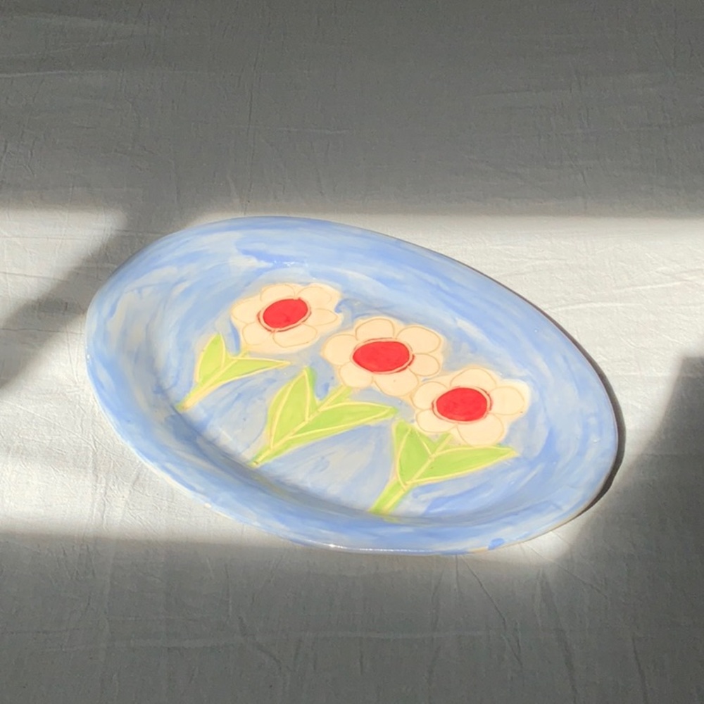 Floral Art Plate with Blue Background